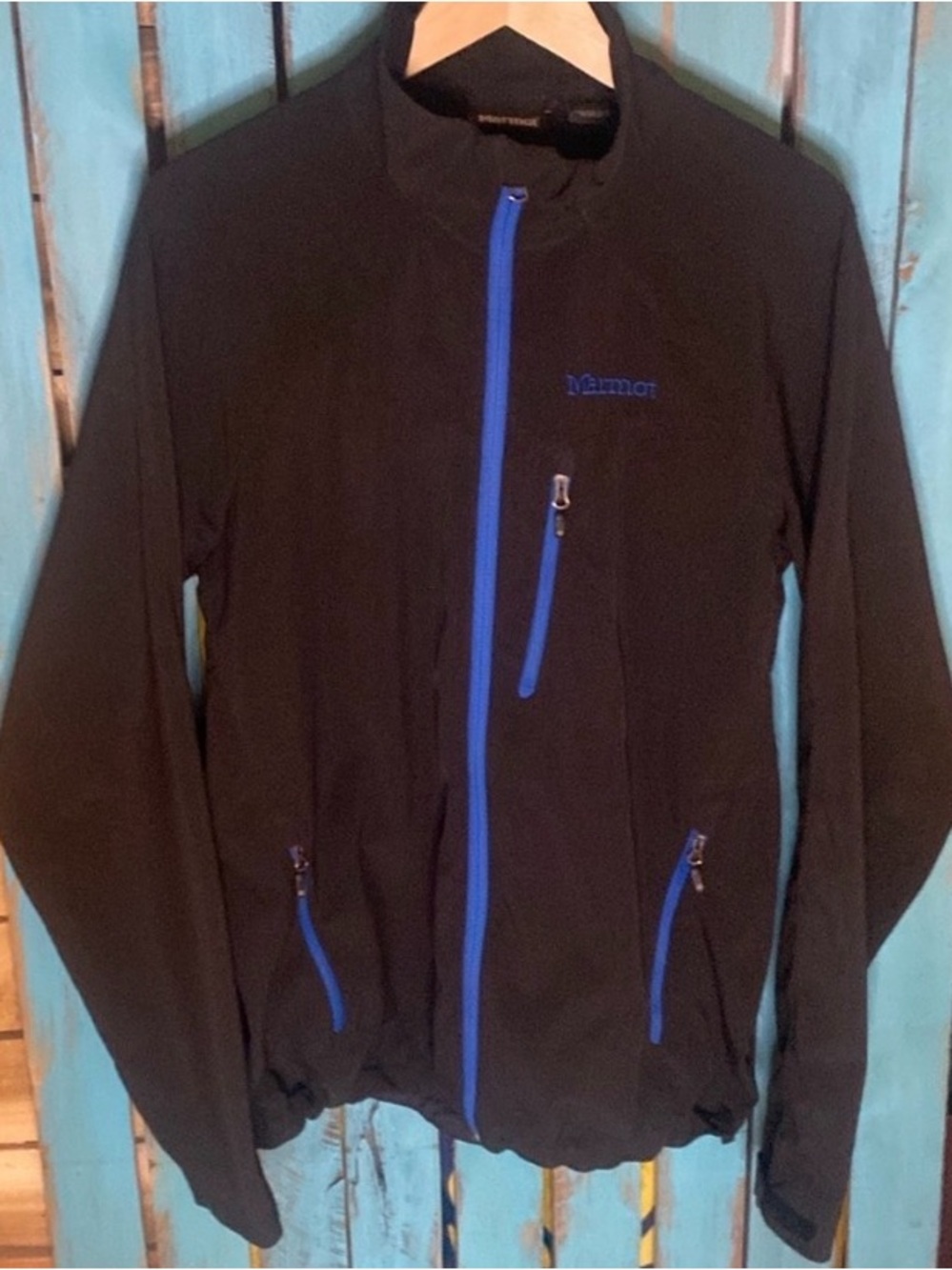 Marmot insulated soft shell jacket full zip size Large black with blue trim